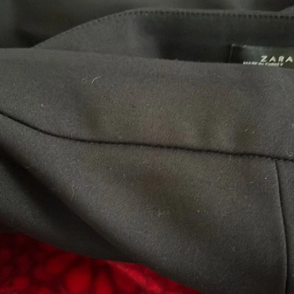 Zara Women medium black pants with side zipper and grommets with scallop edge on